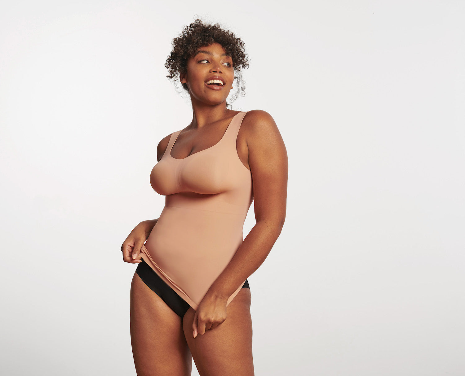 Evelyn & Bobbie Defy Smoothing Tank designed to replace a traditional bra with smooth, supportive fit under tops and jackets.