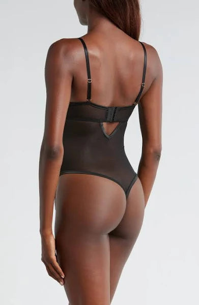 Elegant sheer bodysuit by Kilo Brava featuring intricate embroidery and a thong back, perfect for special occasions.