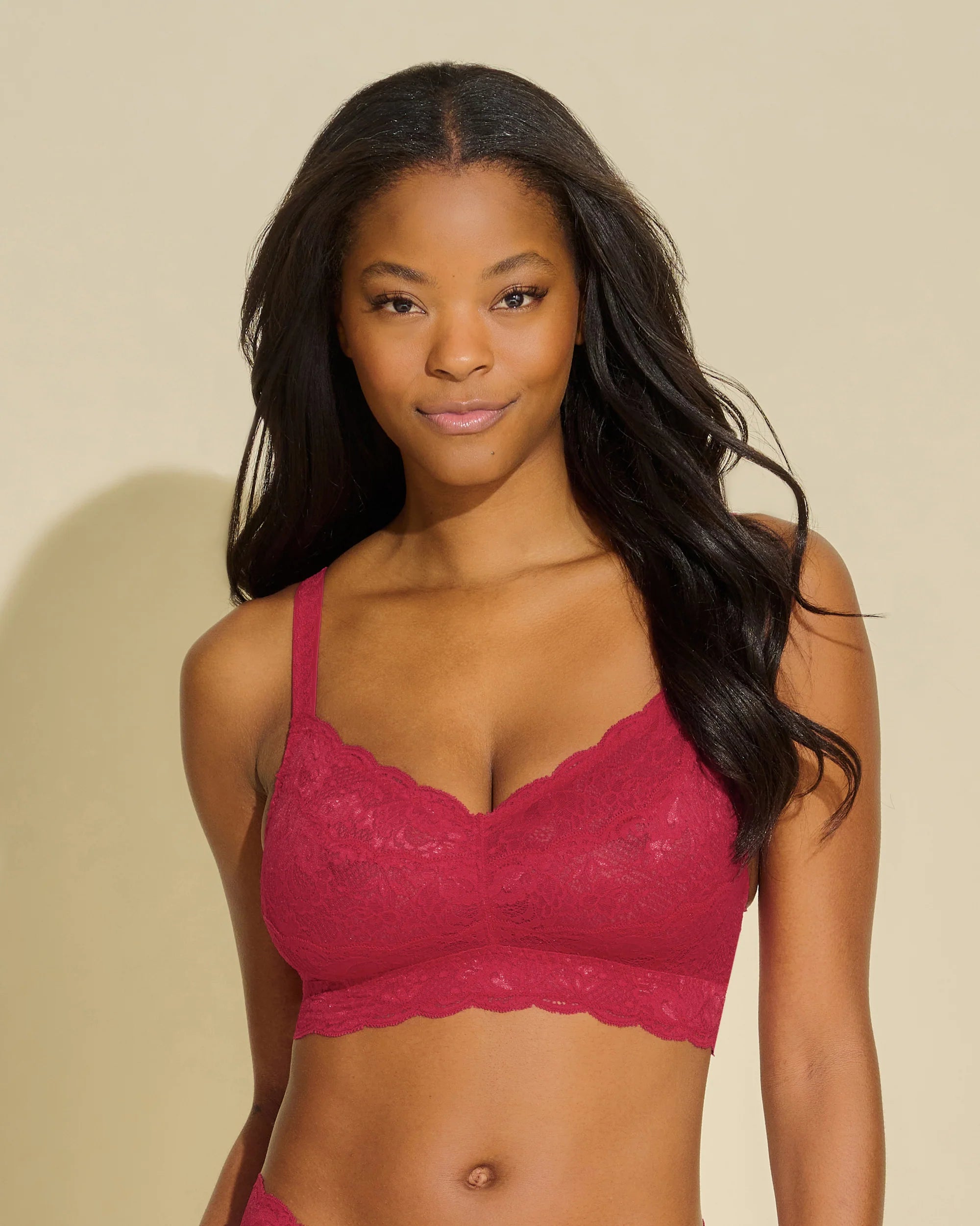 Cosabella Never Say Never Fragolino bra in a vibrant berry shade, featuring intricate floral lace and scalloped edges for a feminine, elegant touch. Designed for both comfort and style, this wireless bralette offers a soft, supportive fit with adjustable straps, perfect for all-day wear.